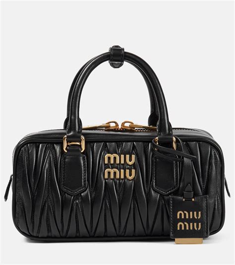 miu miu black purse|miu pocket bag.